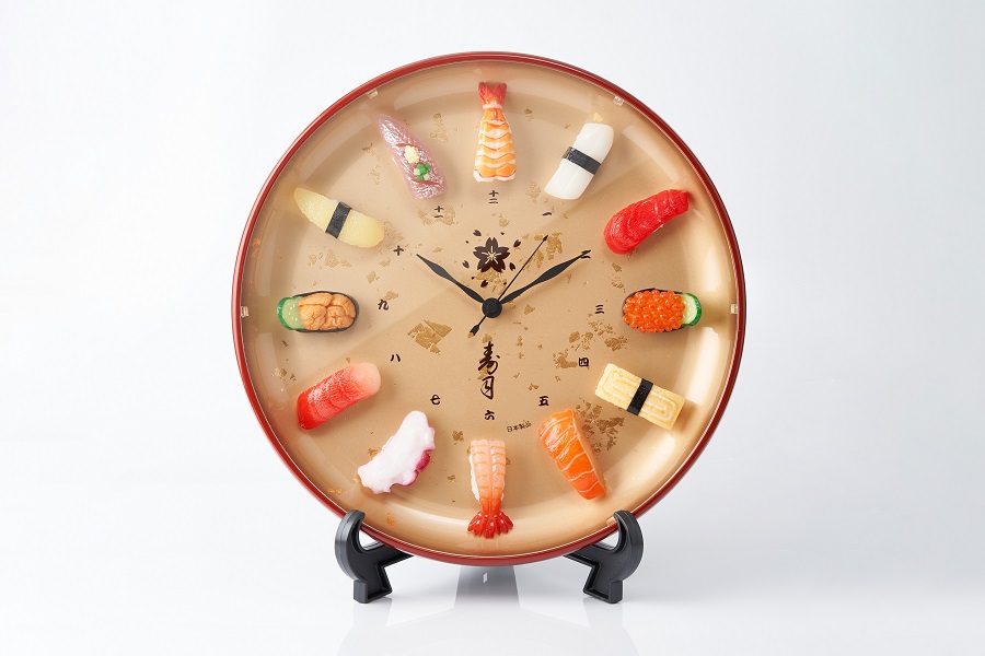 「寿司時計プレミアム」の文字盤に使用されている寿司ネタは、いくら軍艦・数の子・アジ・まぐろ・タコ・甘海老・ウニ軍艦・たまご・サーモン・中とろ・イカ・エビの全12種類